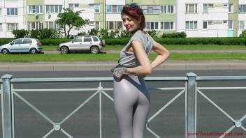 Sexy Natalia walks down the street in tight leggings